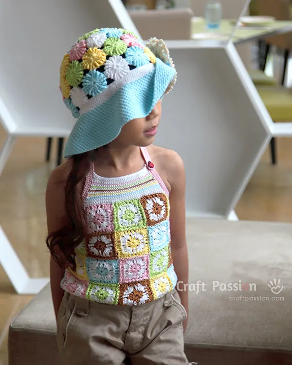 crochet hat with yoyo puff