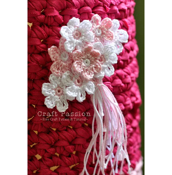 make a small brooch out of these small crochet flowers.