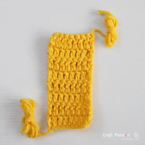 crochet crotch piece for a bee romper.