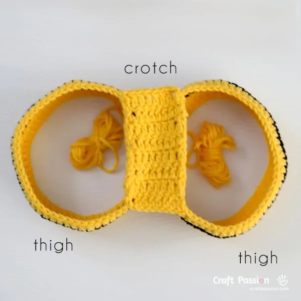 baby romper with additional crotch piece between legs. This provides a comfortable, rounded fit for the baby&rsquo;s legs and diaper area.