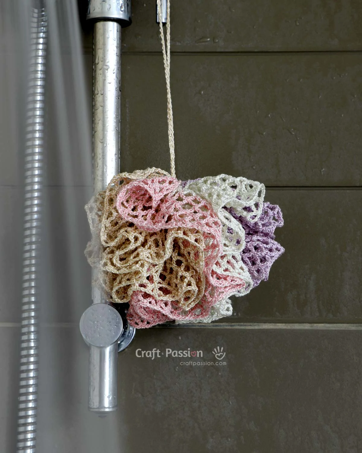 DIY your own shower scrubbie with this easy, beginner-friendly crochet loofah pattern. Great as a washcloth or bath pouf for everyday use or gifts!