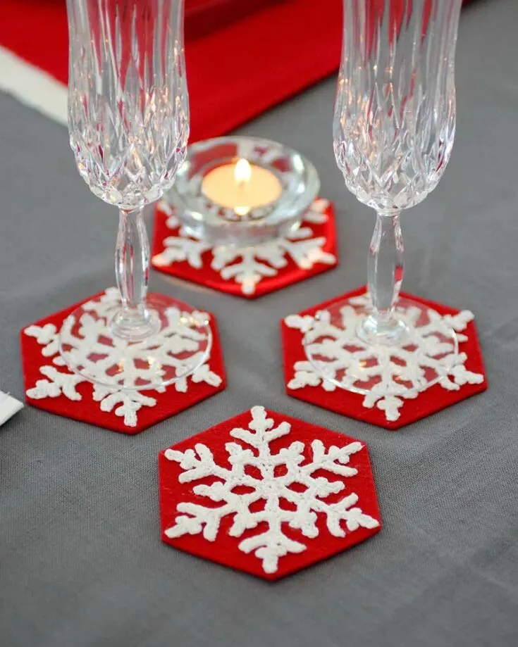 Here's another Christmas crochet project for table setting: whimsical Snowflakes Coasters that burst with holiday spirit even during meals. Crochet your festive snowflakes with this pattern from yours truly!