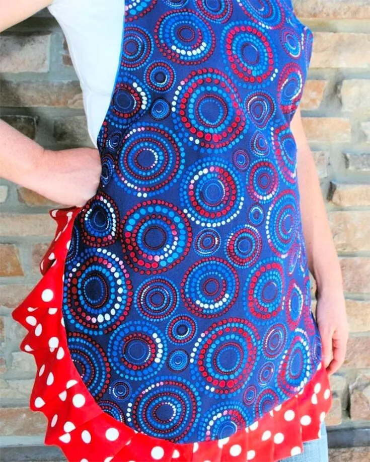 This adorable apron could be made with any two design combinations! It includes a square neckline and a pleated hem for a ladylike look.