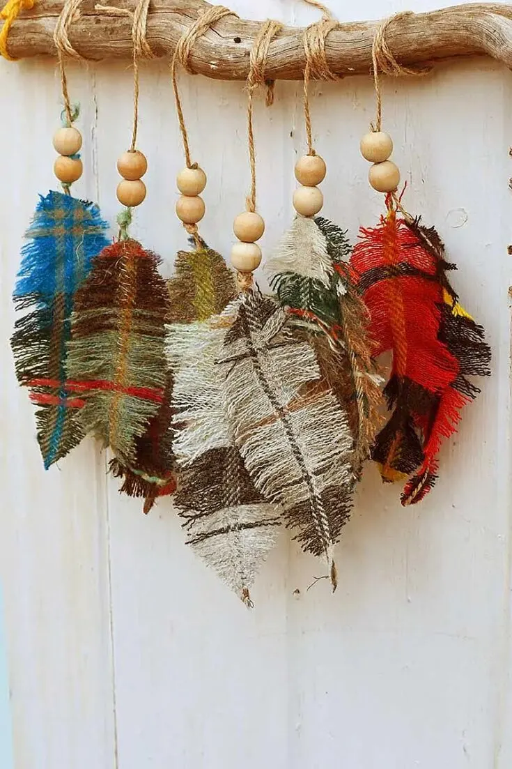 If you have any plaid, tartan or flannel fabric lying around, give these decorative feathers a try! By fraying the fabric and some simple stitching around twine, you can make these gorgeous feathers for yourself.