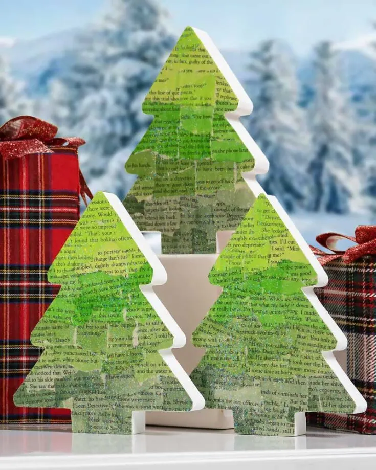 Decoupage is an art form where you decorate surfaces with several layers of cutouts. This tree utilizes that method by making Christmas trees out of it! You can even turn it into an engaging activity where you have meaningful quotes plastered on the tree's surface!