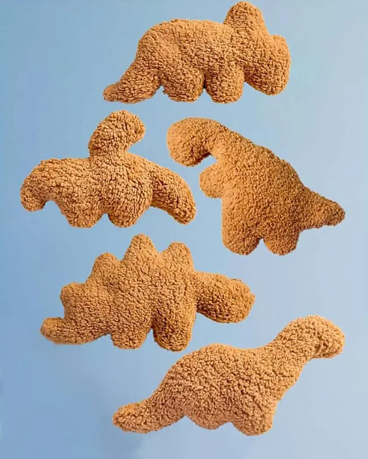 Do you have a dino nugget obsessed person in your life? Make a set of these dino nugget plushies for them! They're irresistibly fun and sherpa or fleece fabric mimic the texture of dino nuggets so well that they look identical to the real thing.