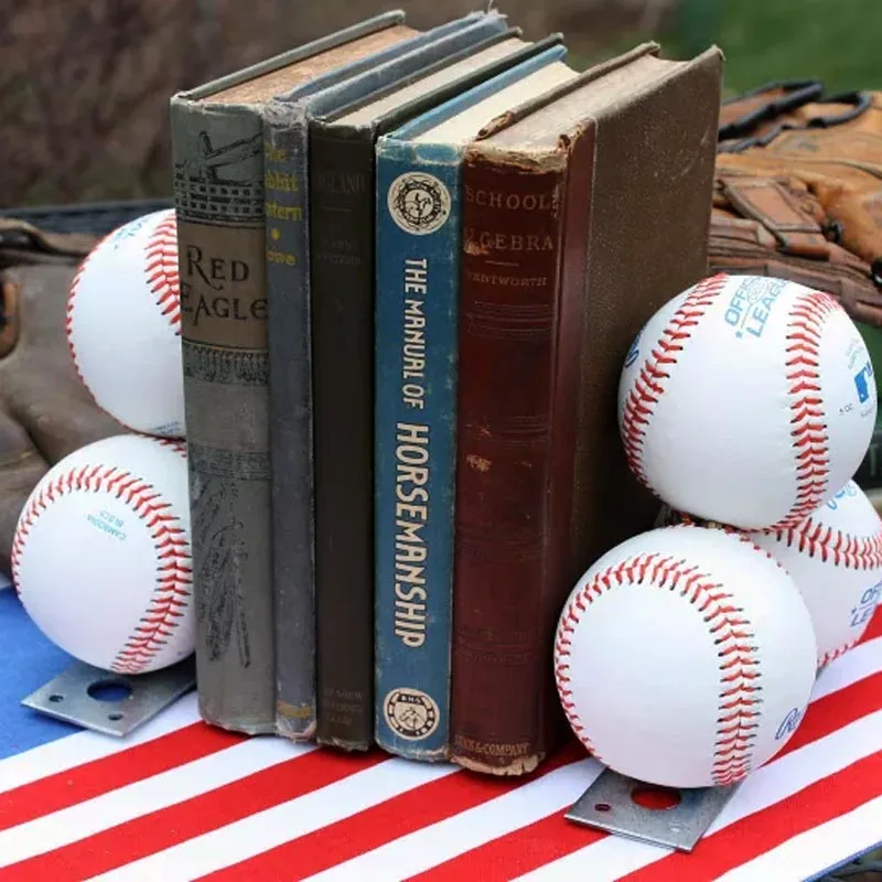 Hit a home run of style to your bookshelf. Make your reading corner feel like a ballpark full of excitement as you use old baseballs to transform it into the ultimate pitch! Time to hit it with a sporty bit of charm with these bookends!