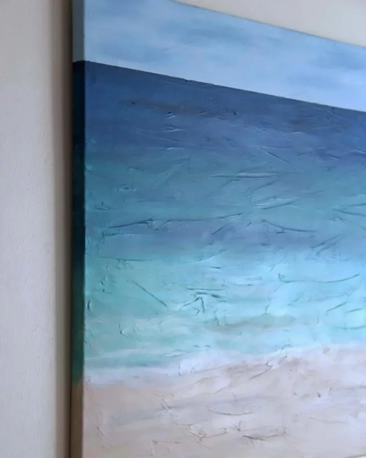 Make your very own beach paradise right in the comfort of your home. You can also add textures to your canvas to make your beach even more realistic! Sandy tones and sunny blues bring a scenic, serene shoreline.