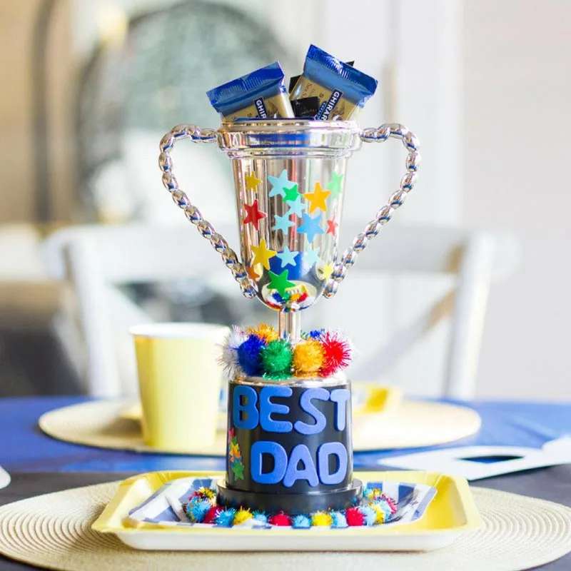 Isn&rsquo;t this craft so cute? Your Dad will be in for a surprise as you make this DIY Best Dad trophy for Father&rsquo;s Day. Add some cute decor on it, such as pom poms and star stickers, to make it extra sweet. Finally, fill the cup with his favorite snacks that will surely melt his heart.