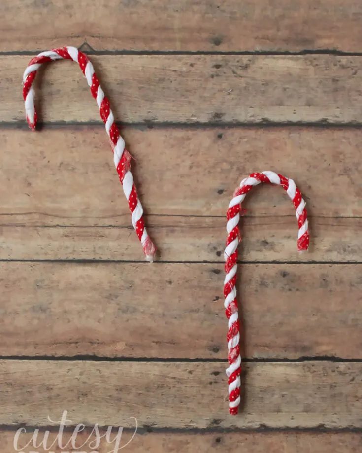 We could never forget the iconic candy cane this festivity. They are so easy using fabric scraps that you can find anywhere fitting into the theme of 'dollar tree crafts' perfectly. Give it a go!