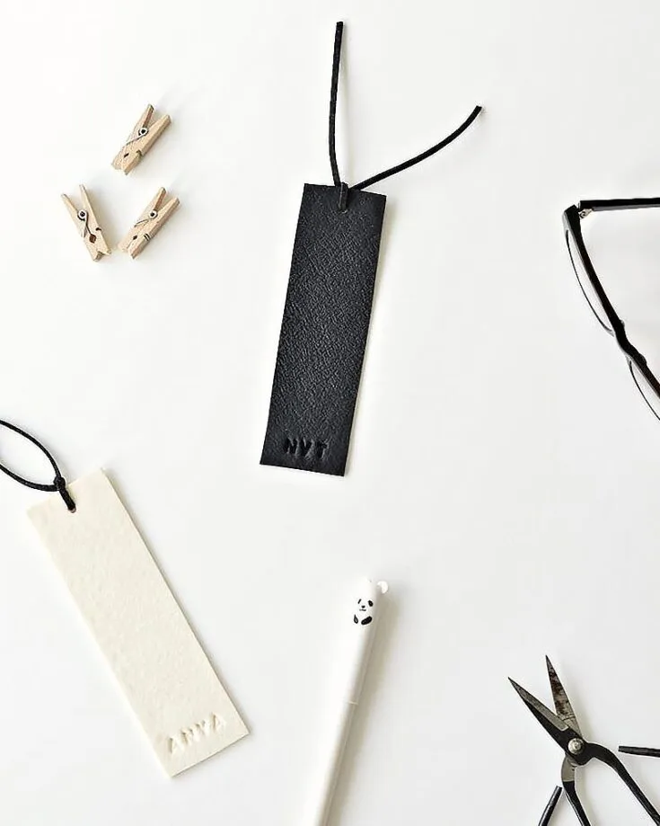 This Faux leather bookmark uses Polymer clay to create a leathery texture. They are effortless to make, and you can even personalize them by stamping your name onto the bookmark!
