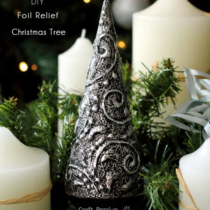 Make a chic elegant foil relief Christmas tree to decorate your home. Easy DIY Christmas craft with cone mache, dimensional glue, aluminum foil & shoes polish.