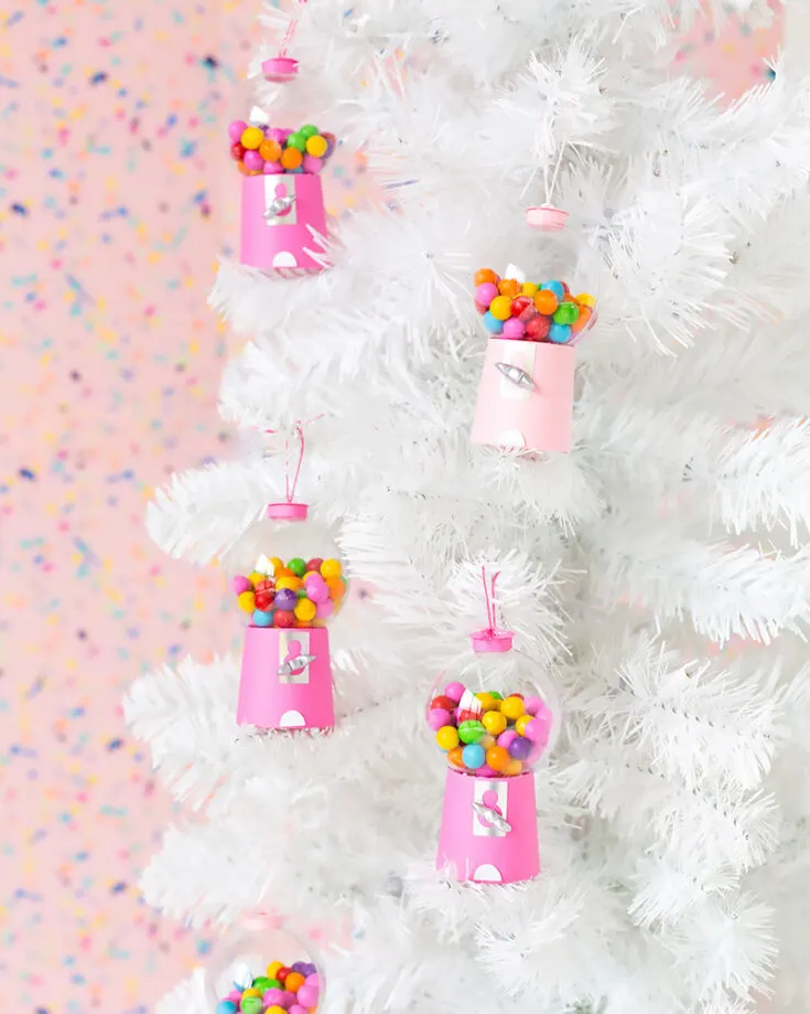Craving for something sweet and want to satisfy that sweet tooth? These Gumball Machines will satisfy them! Entice your friends and family with a sweet stare by making these and hanging them on your tree. Try it!