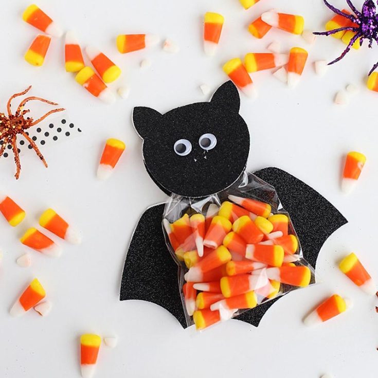 Place your favorite candy in small, clear, food-safe bags and staple them onto a googly-eyed cardstock bat design. Use glitter cardstock to bring your bat bags to life for an extra touch of sparkle!
