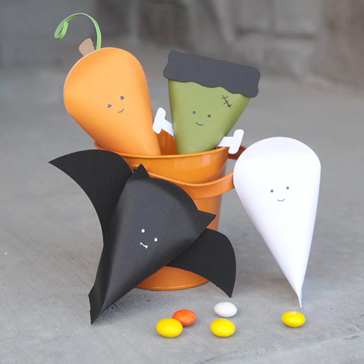 Make your Halloween special with these adorable little treat boxes featuring fun characters! They&rsquo;re perfect for filling with candies and are super easy to put together with the simple guide provided. These cute treat boxes will make handing out treats even more fun!