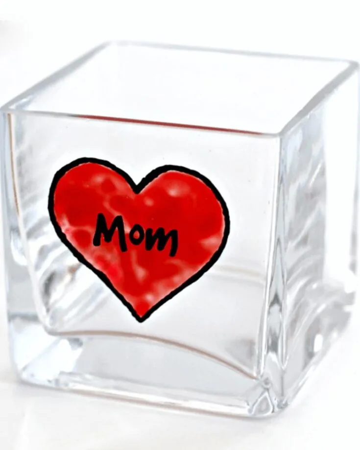 Candles are essential at home to make your space smell fabulous and act as decor. This Mother&rsquo;s Day, make her an unforgettable DIY candle holder to light up both the room and her heart. Share the love by adorning a simple glass holder with heartfelt charm, and it will leave a warm glow that lasts beyond her special day.