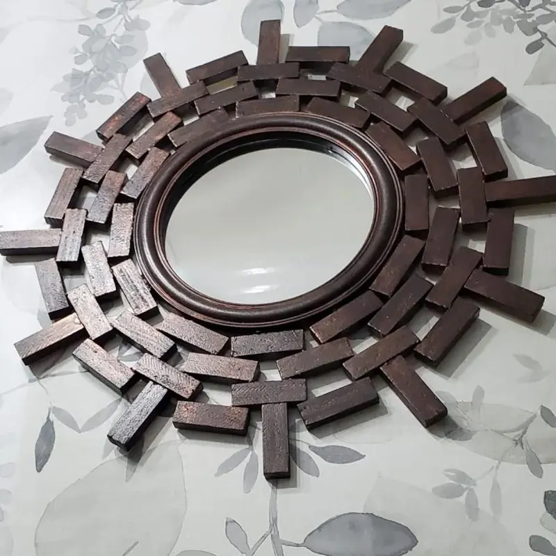 You can&rsquo;t find mirrors like this just anywhere! You would have to grab some wooden blocks from the dollar store to start crafting this one-of-a-kind mirror decor. This Jenga Block mirror would be a fun evening craft as you would have to meticulously arrange the blocks symmetrically to achieve a stylish and modern flair.