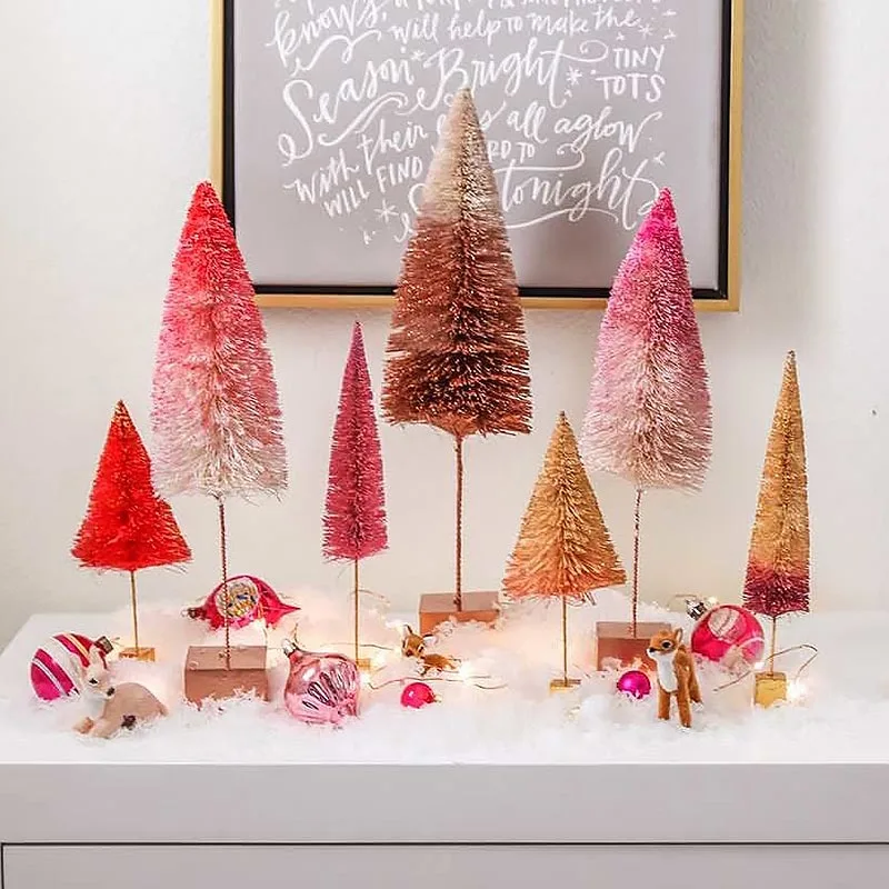 Ombre is a shade of color or gradient moving from light to dark. Why not apply that to some trees that will make a nice decoration? This is one of the more colorful Christmas decoration ideas. Learn to make some in the tutorial below to spice up your place!