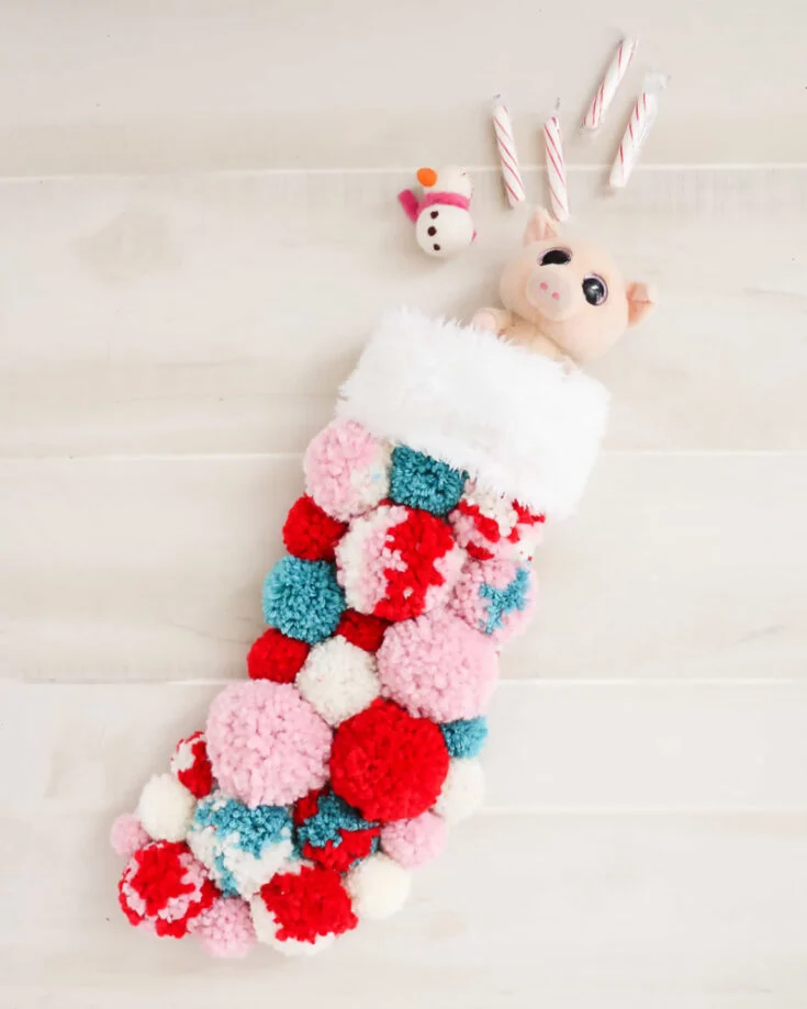 A good twist you can try out this Christmas! Instead of normal stockings, you can make them out of pom poms, they are fluffy and also offer a vibrant twist to them. Try it out and let us know!
