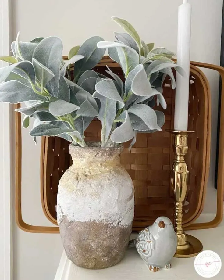Learn how to make an affordable and easy DIY Pottery Barn dupe vase with this tutorial from Arts and Classy. This handmade piece mimics the look of high-end pottery that is sure to leave your guests impressed.
