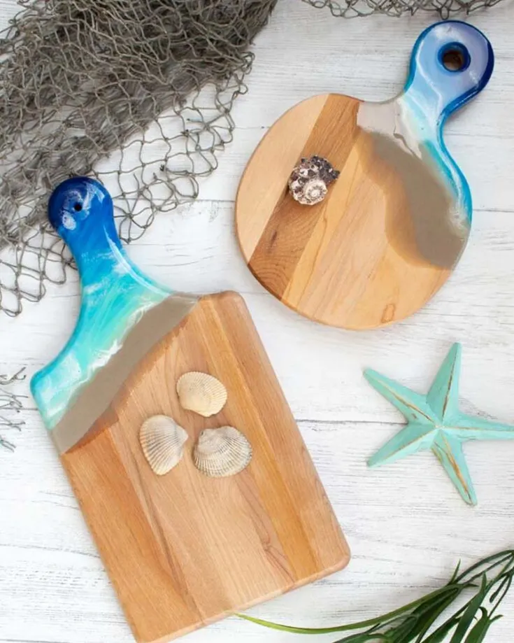 Combine this natural wooden cutting board with some resin to create this coastal-inspired resin cutting board. The resin resembles the water and provides a layer of protection for the cutting board.