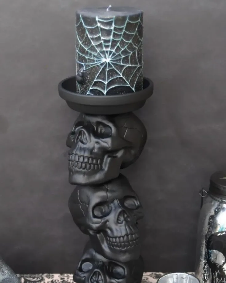 Here is another easy Halloween decoration for you to try out! Create a realistic, spooky scene by following this tutorial. It is such a creative way to display your candles and take them to the next level.
