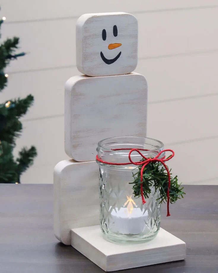 Snowman Candle Holder... won't the snowman melt? We aren't talking about a real snowman! Check this tutorial out that teaches you how to make an adorable snowman. They will hold your candles fashionably!