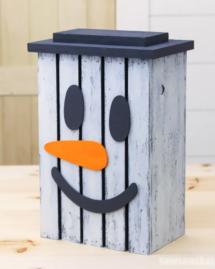 What's cuter than a snowman? A Snowman Lantern that can light up and spread joy! Learn to make this lantern as you place them around your house to illuminate it. The wooden carrot nose adds a nice pop of color to the whole lantern.