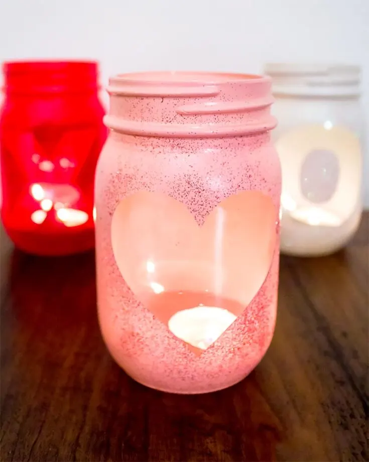 If you plan to burn some candles for your romantic dinner party, you may as well give your candles a glittery, colorful glow with these candle holders.