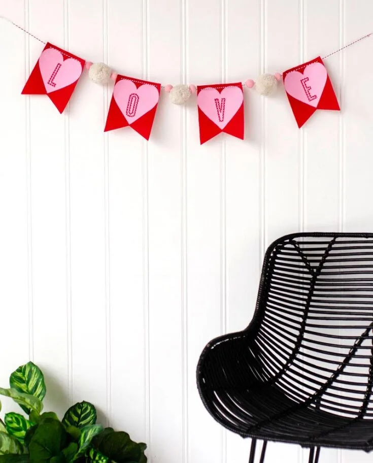 Deck your halls with this beautiful diy Valentine's garland. Prepare some scissors, pens, string, and colored paper, and you're good to go!