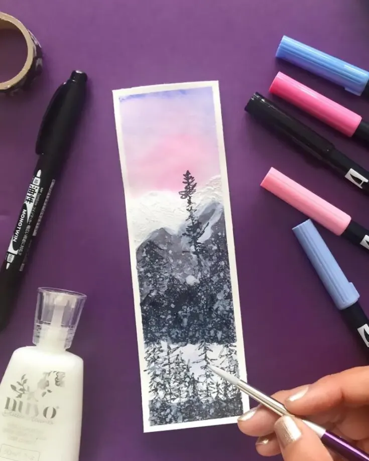 Paint a snowy wonderland with this step-by-step guide! Capture winter's charm with easy yet fun techniques, creating beautiful sceneries. It is a fun project for all who love the magic of winter landscapes.
