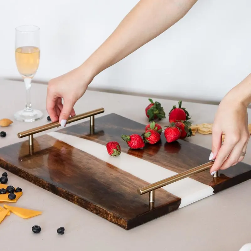 Similar to the serving tray, here's another rendition of it! You can create this beautiful tray that will fit right into your kitchen decor using natural wood and resin.