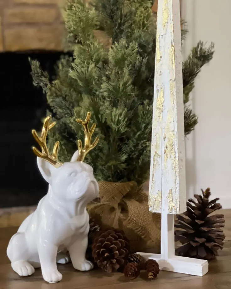 A wood shim is a thin wedge of wood traditionally used for positioning and adjusting other building elements. If you happen to have any lying around, make use of it! Turn it into this rustic and simple tree.