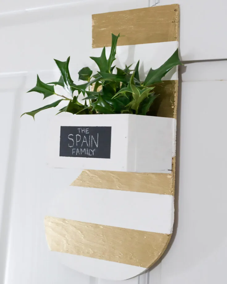 Whether you use this as an actual stocking or a door hanger, we can agree it is so simple and adorable. You can choose to paint it with different colors to personalize them even more. Get going!