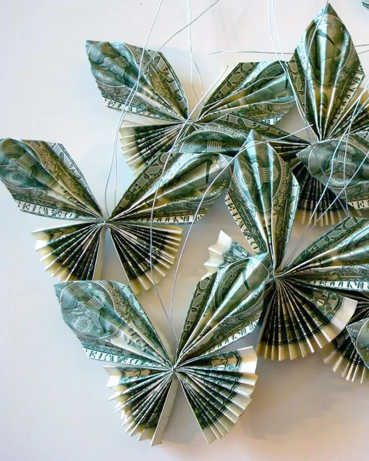 Of course, one lei is never enough! However, the same leis over and over would get boring too, don't you agree? Therefore, we've picked out this dollar bill butterfly lei as well! It is also fairly simple to make, and I'm sure you'll have just as much fun making it.