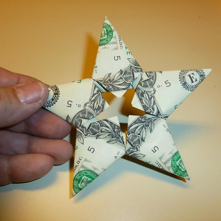 Your eyes will shine as bright as this dollar bill origami star after trying it out! It's a simple and fun craft that you can make anywhere, and since the steps are so easy to remember, you'll find yourself with a handful of stars before you even realize!