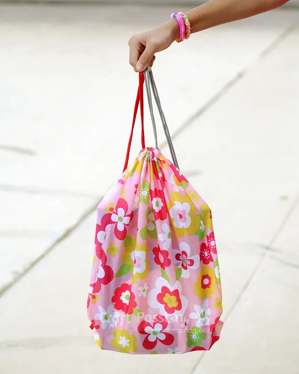 Get the pattern and tutorial to sew drawstring backpack. Great as the kid's school activity bag or as the laundry bag etc.