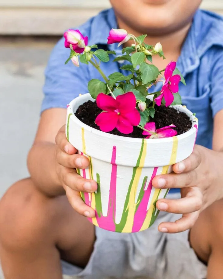 Let your creativity flow with this drip paint pot that is just mesmerizing to look at. Instead of melting up crayons on a canvas, turn her pots into a magical world of wonder to add more vibrant colors and creativity to her garden. She will love it!