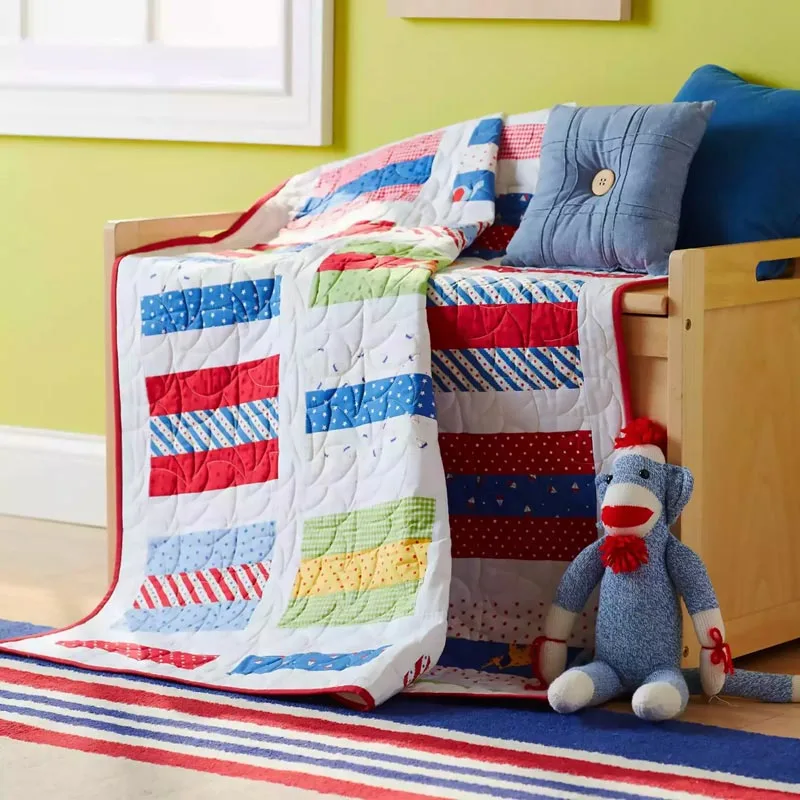 Like its name, this quilt design is as easy as 1-2-3! It uses jelly roll strips to create colorful rectangle shapes on the design, giving it a cute flair for a baby quilt. Whether to put in a nursery or gift it to your friend&rsquo;s baby shower, this quilt will be a keepsake and treasured for years to come. The finished size is 46 &frac12;&rdquo; x 50 &frac12;&rdquo;.