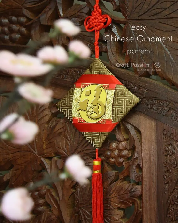 Quick to create and bursting with festive charm, this Chinese New Year ornament features a vibrant design that symbolizes good fortune. Made with simple materials like silk fabric and red packets, it's both meaningful and easy to craft.