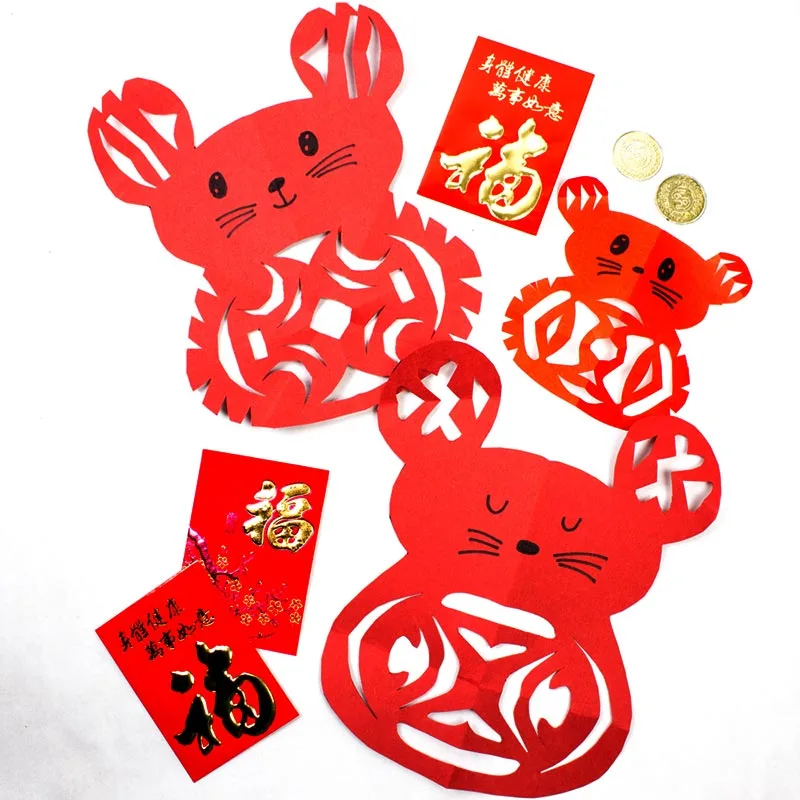Celebrate the Year of the Rat with this simple paper-cutting craft! Kids can fold and cut red paper to create adorable rat designs inspired by traditional Chinese art. It's a fun and creative way to enjoy the festive season!