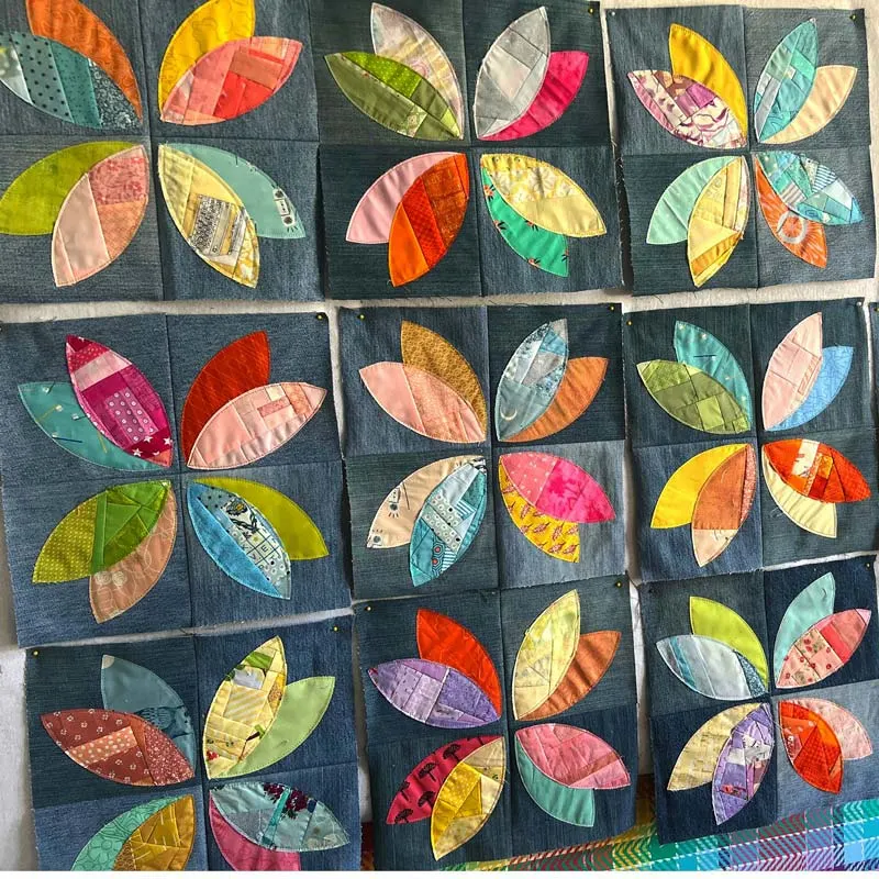 Upcycle your old denim clothes by turning them into a gorgeous and unique quilt! By following this tutorial, you'll learn how to do a quilt-as-you-go method with the raw edge applique for the orange peel to make your design stand out! Isn't it stunning?&nbsp;