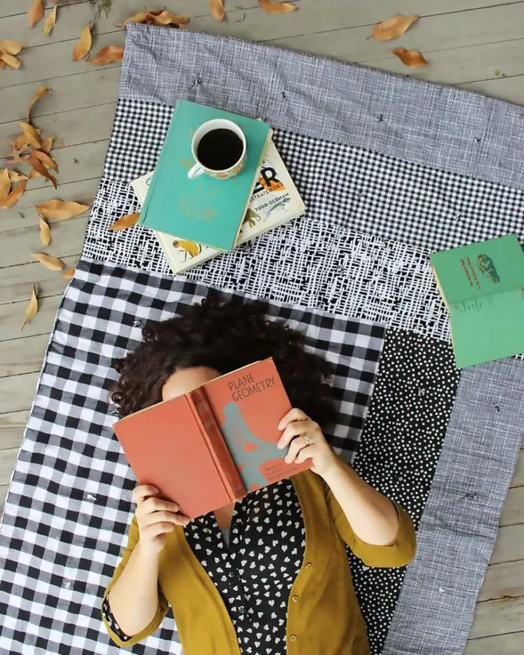 Speaking of rustic, this Easy Patchwork Quilt is one that every fall girly should own! This DIY tutorial will guide you through piecing together grey and white fabrics to create a personalized quilt that adds a homely and cozy vibe to any space. It&rsquo;s a simple throw quilt ideal for lounging on the couch or wrapping yourself by the fireplace.