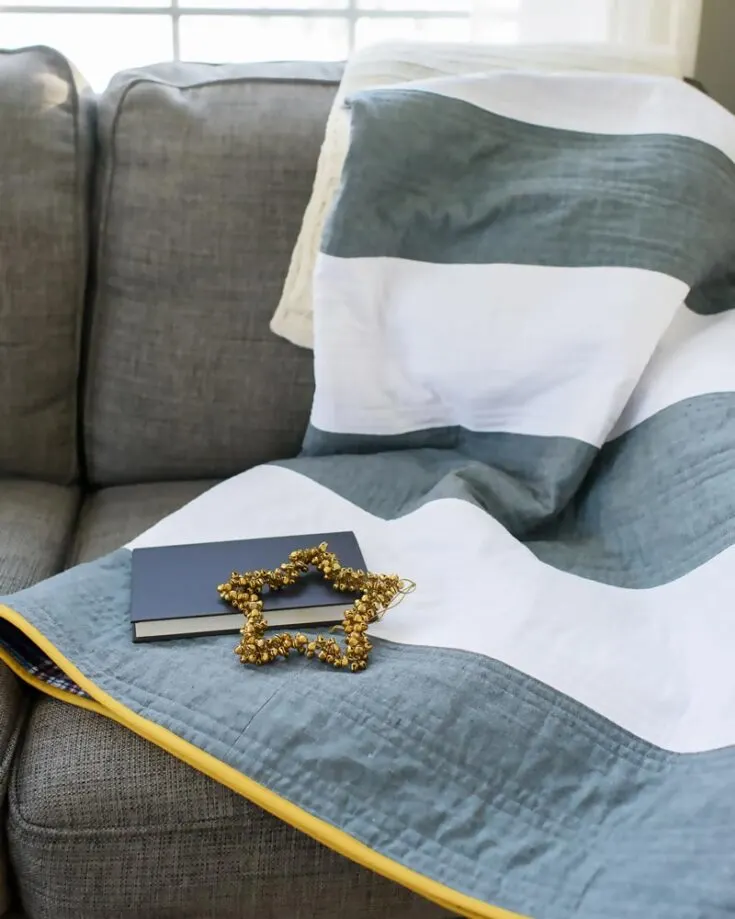 Sticking back to the basics, this Easy Striped Quilt is simple and straightforward to make, and it&rsquo;ll elevate your bedroom decor with a rustic vibe. It features clean, modern lines and an easy-to-follow design that is great for beginners! It&rsquo;s a fast quilt to make, and it makes for an adorable and thoughtful Christmas present. The quilt is approximately 52&rdquo; x 63&rdquo;.
