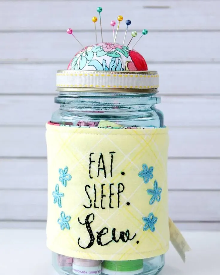 This embroidered mason jar pin cushion is such a creative idea to upcycle an old mason jar lying around your house. After adding the cushion to the jar lid, you can even use the jar as extra storage for spools or thread and measuring tape. You can even personalize the embroidered message to anything you&rsquo;d like!