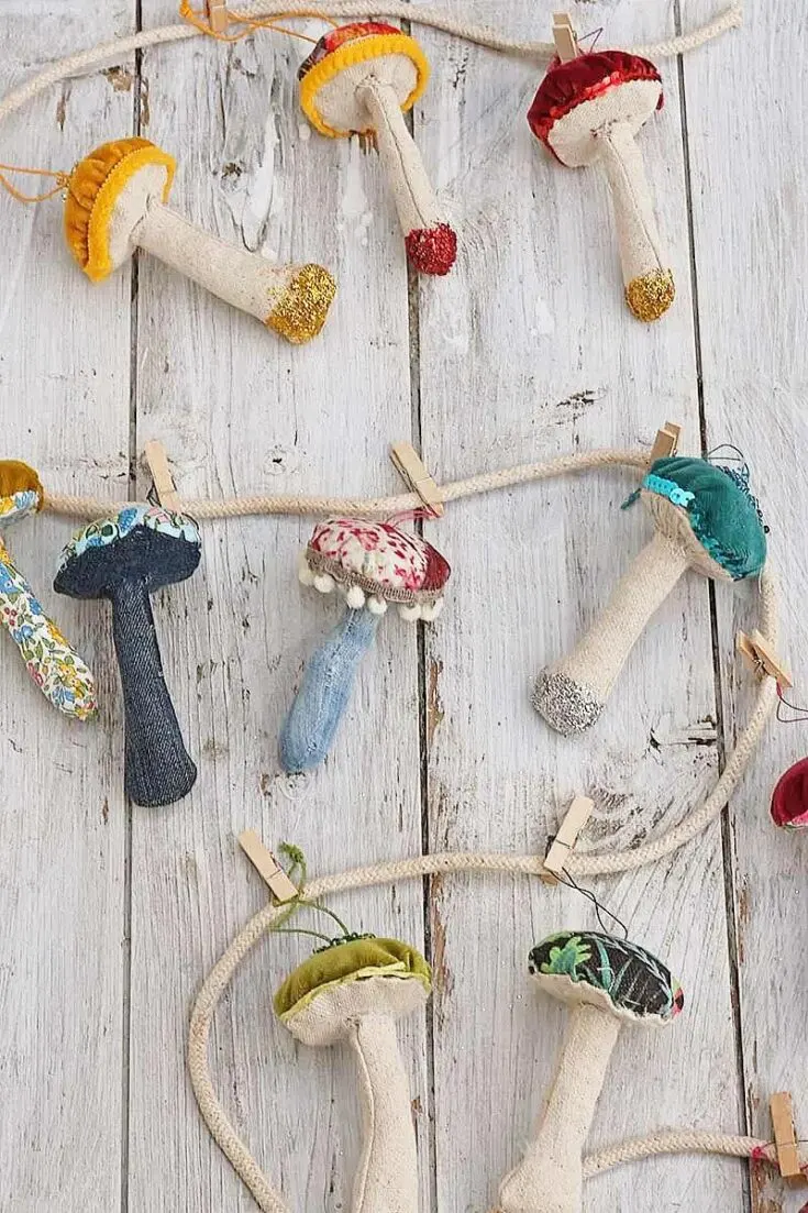 Create some whimsical fabric mushrooms using a hot glue gun or some simple hand sewing. Using some cardboard to help it keep its shape, these mushrooms are great as gifts or decor.