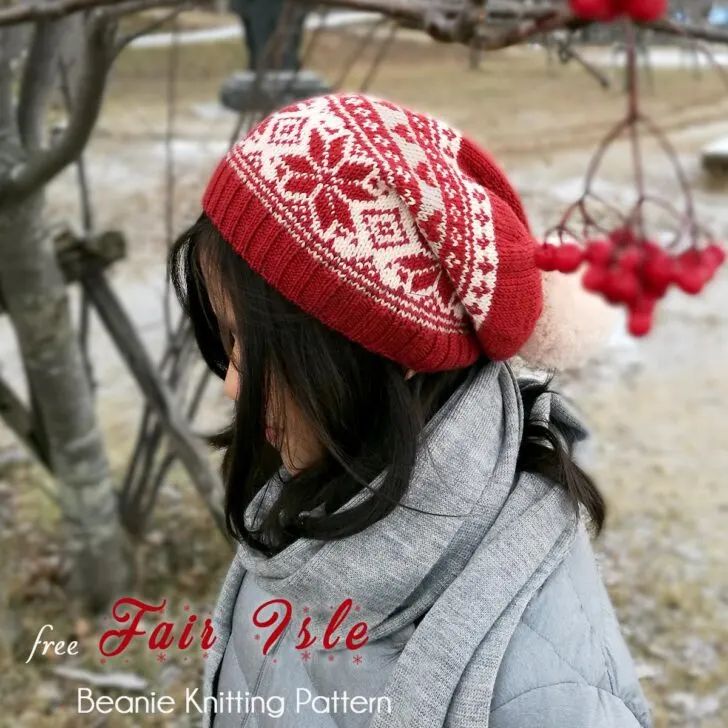Free beanie knitting pattern to knit a beautiful Nordic Fair Isle pattern, slouchy shape with a pom-pom. Or knit with single color for a plain beanie.