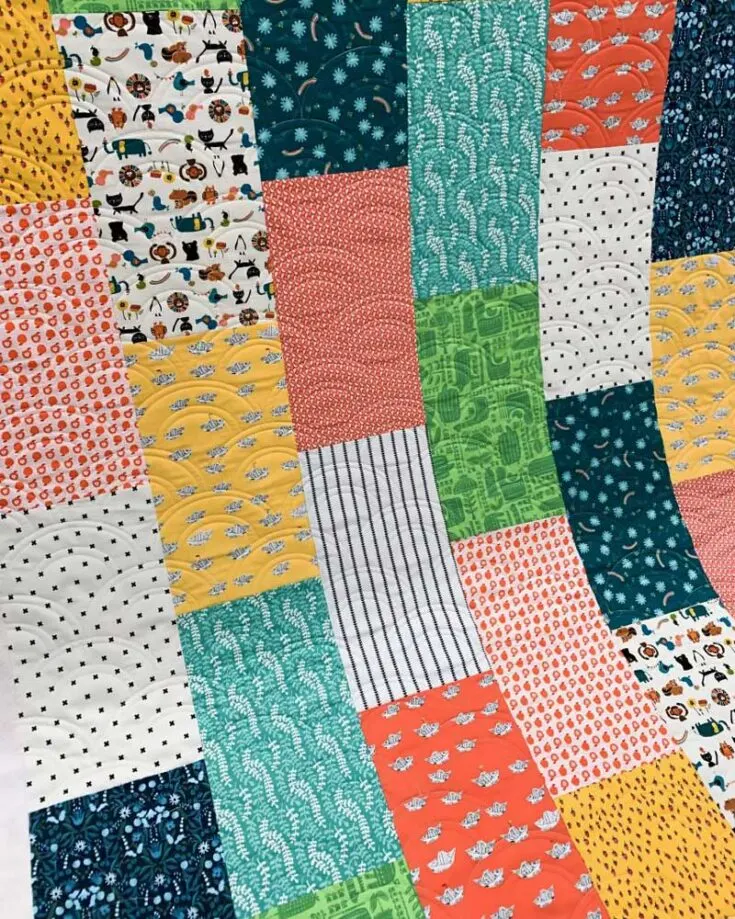 First on the list is this fast and easy quilt pattern! This gorgeous design has a detailed tutorial to guide you into making a 57" x 70" quilt. It measures like a great lap-sized piece and is perfect for larger prints.