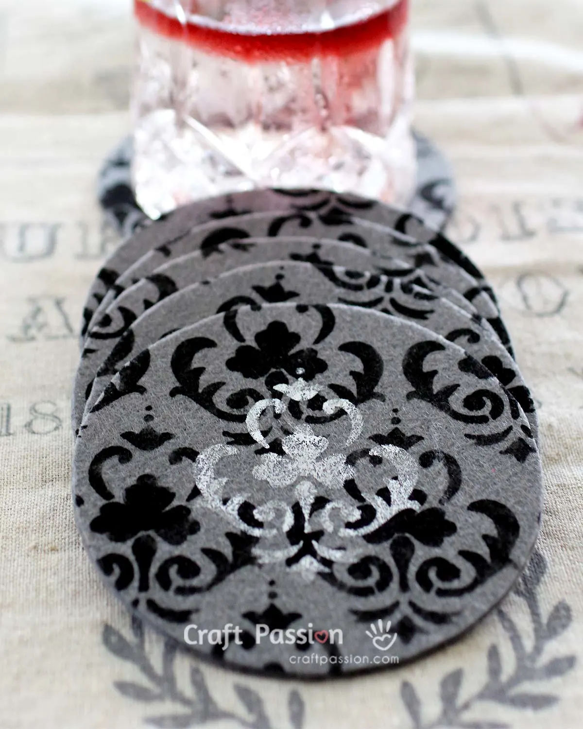 A quick and easy tutorial on how to DIY beautiful stenciled felt coasters. They're perfect to make as house warming gift. You will love these coasters.