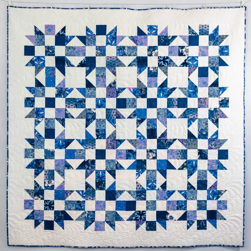 Make a throw quilt with this intricate Five Patch Star Quilt pattern! This lovely 70&rdquo; x 70&rdquo; quilt design can be made with fat quarters or using up scraps of fabric, and it comes with various layout styles for you to choose from. It&rsquo;s a beginner/ advanced beginner project, and as mentioned above, this quilt mixes square blocks to give it a bit of diversity.